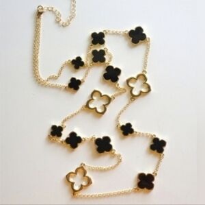 Stylish Black Quatrefoil Clover Necklace with Gold Cutouts - 40 Inches
